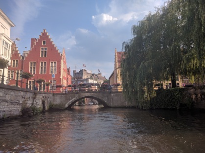 Canals of Ghent. Our Airbnb was in the yellow house behind the tree.